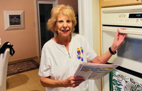 Suzanne Rosoff next to her microwave oven