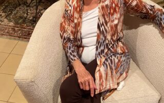 Suzanne Rosoff relaxing in her chair