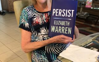 Suzanne Rosoff with "Persist" book by Elizabeth Warren